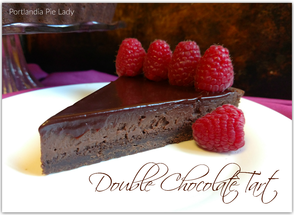 Double Chocolate Tart: Silky melt in your mouth chocolate truffle filling in a chocolate sugar cookie crust, covered in a decadent chocolate ganache glaze. BAM! Your kitchen is now a swanky high-end bakery.