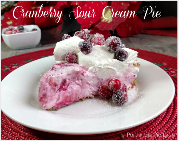 Cranberry Sour Cream Pie: Christmastime cranberries combined with creamy sour cream, decadent mascarpone cheese and topped with sugared cranberries. Holiday Spirit Pie!