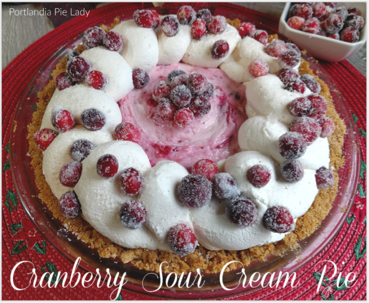 Cranberry Sour Cream Pie: Christmastime cranberries combined with creamy sour cream, decadent mascarpone cheese and topped with sugared cranberries. Holiday Spirit Pie!
