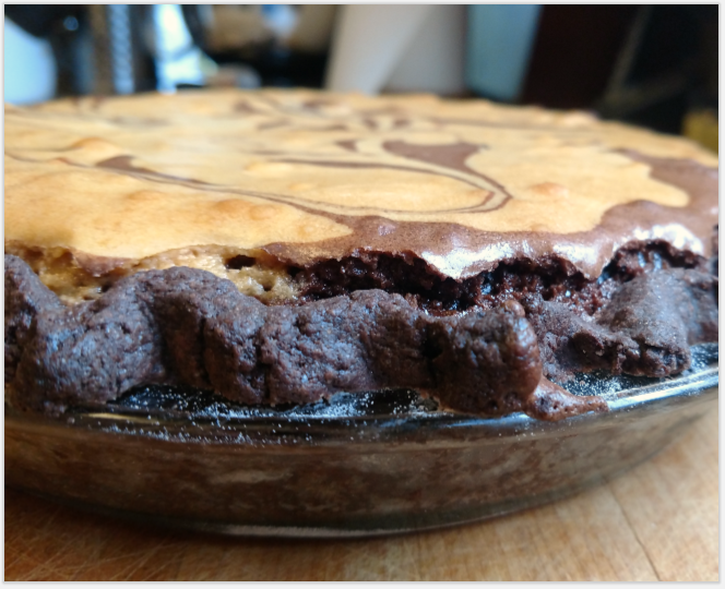 Butterscotch Fudge Brownie Pie: Rich gooey fudge brownie pie baked with a butterscotch swirl and a chocolate pastry crust.  Go ala mode or with a glass of milk, safety first!