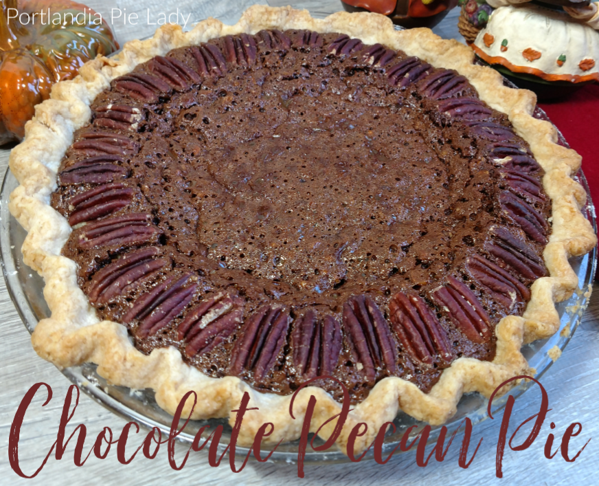 Bittersweet chocolate loaded with chopped pecans to ensure every bite is packed full of nutty goodness in a rich decadent pecan pie.