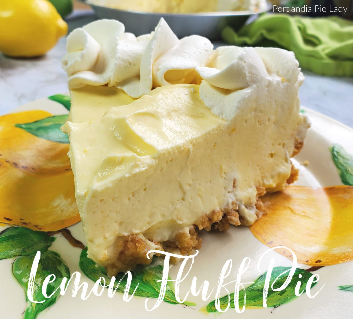 Lemon Fluff Pie made with luscious lemon curd and whipped cream with a lemon cookie crust.  Fabulous straight from the fridge or as a lemony frozen dessert. 