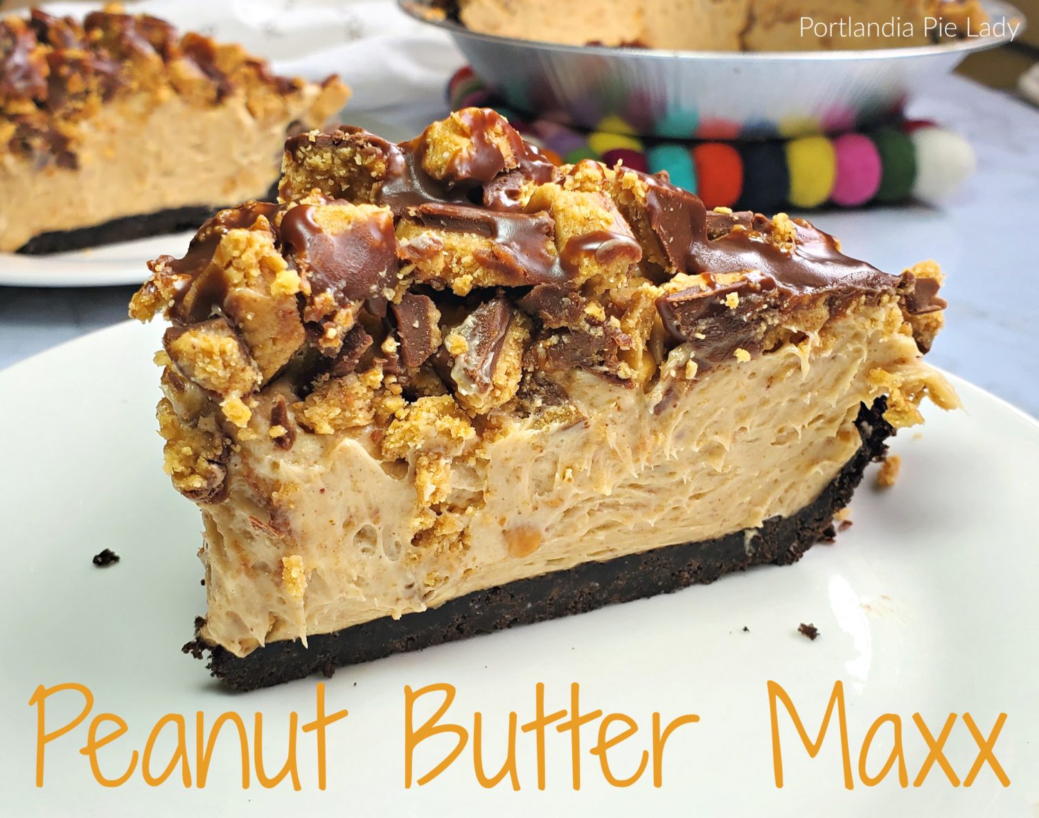 Peanut butter & cream cheese combined with whipped cream into a luscious filling topped with homemade peanut butter cup topping & milk chocolate ganache!