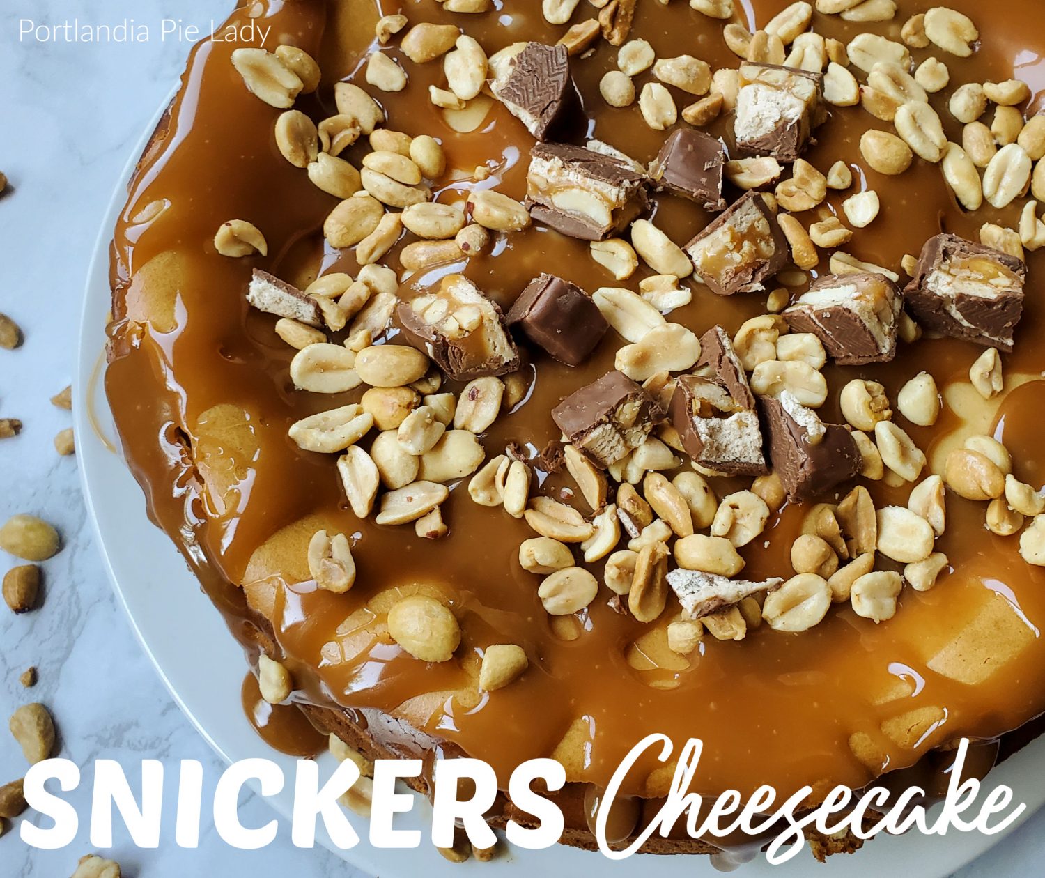 Snickers Cheescake, peanuty flavored filling loaded with Snickers and topped off with salted caramel sauce and roasted peanuts.  Dessert is great tonight!