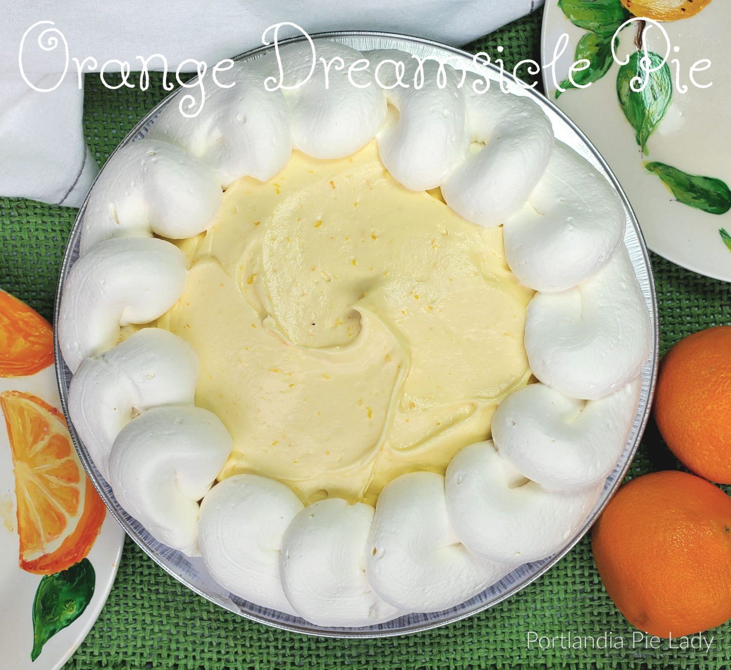 Orange Dreamsicle Pie perfectly captures the creamy vanilla ice cream center surrounded by the orange quiescently frozen treat we craved for every summer!