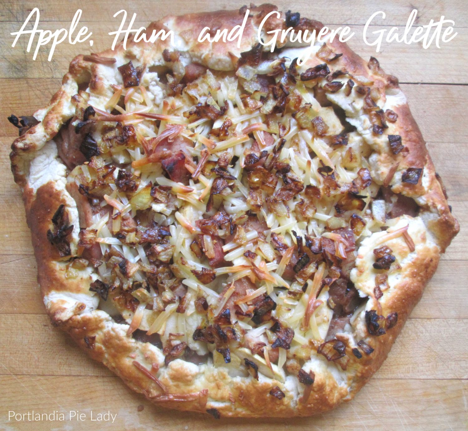 Layers of Crisp Tart Apples, Smokey Ham, and Gruyere Cheese with Balsamic-Honey Mustard in a rustic Galette crust will keep your taste buds wanting more!