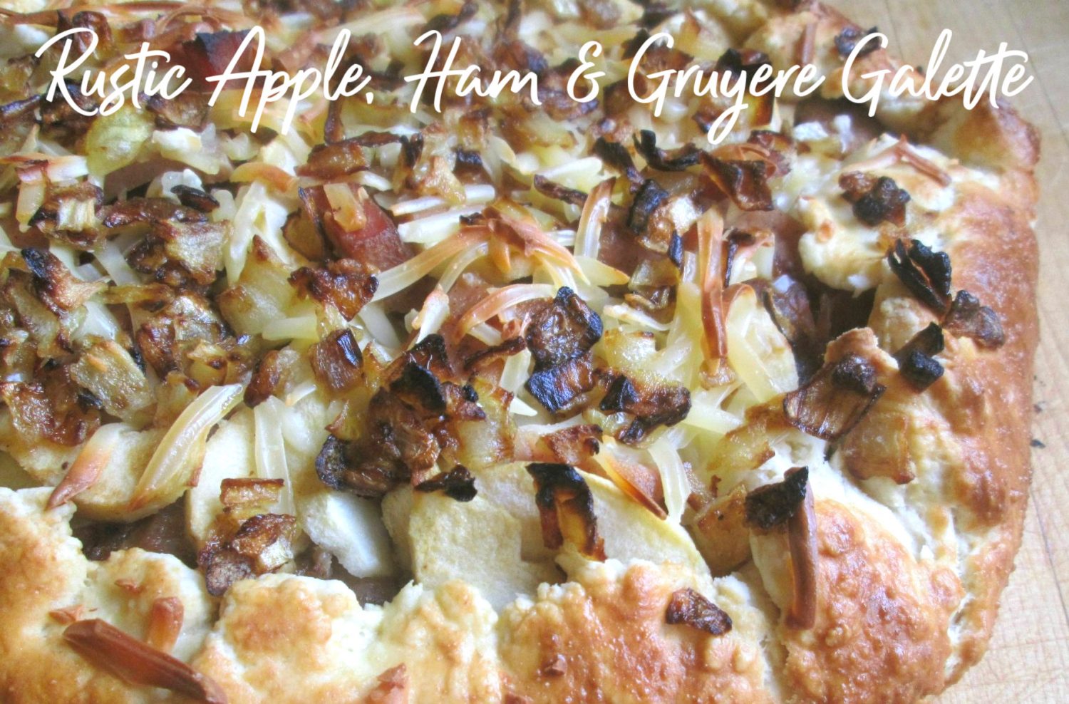 Layers of Crisp Tart Apples, Smokey Ham, and Gruyere Cheese with Balsamic-Honey Mustard in a rustic Galette crust will keep your taste buds wanting more!