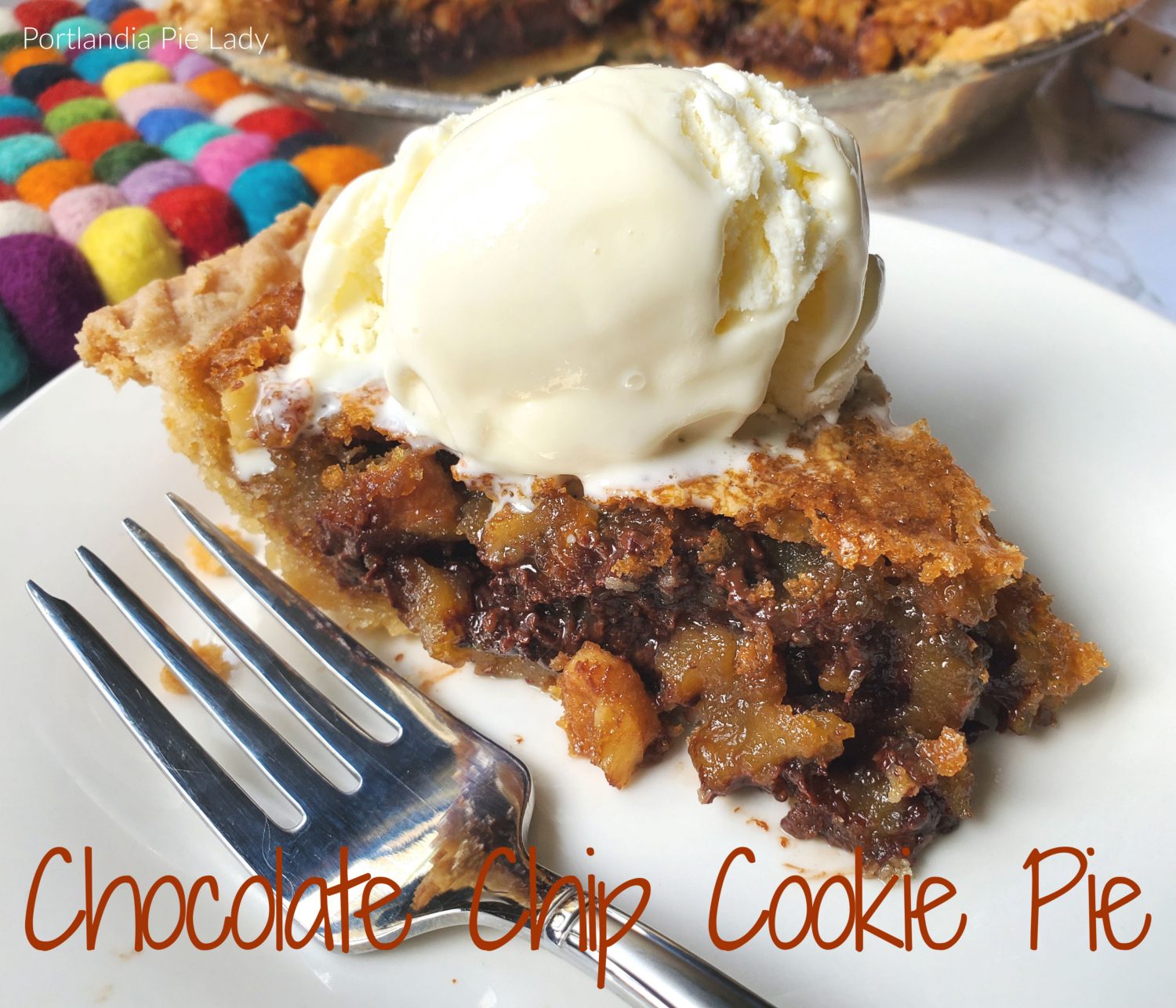 Gooey Chocolate Chip Cookie Batter Pie: Packed full of chocolate, walnuts, and a butter batter creating a gooey luscious filling and buttery flaky crust!