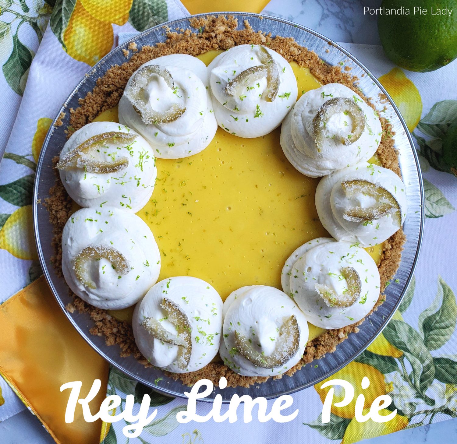 Key Lime Pie, a creamy burst of lime welcoming some warm summer nights with a cool tropical burst of key lime pie with key-lime infused whipped cream.