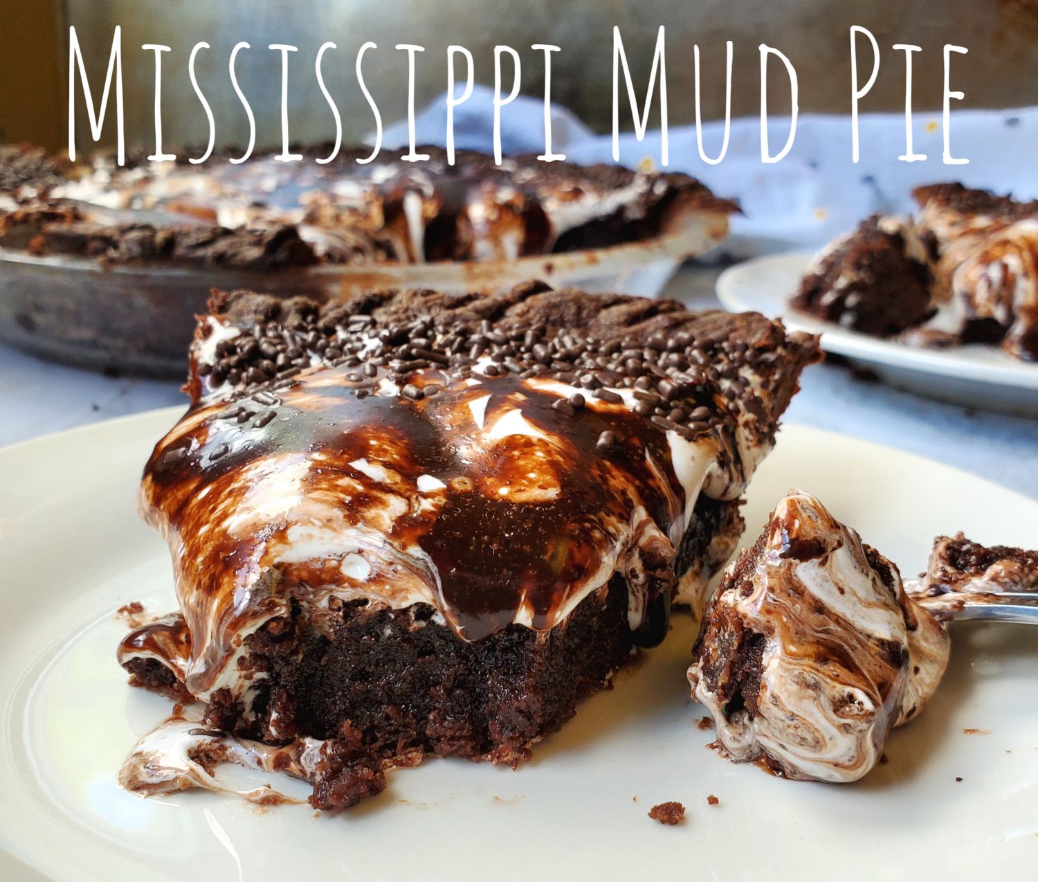 Mississippi Mid Pie: Dive into this ultra chocolaty gooey brownie pie filling, oozing with loads of marshmallow fluff, and dripping with a fudge icing sauce; be still my heart.