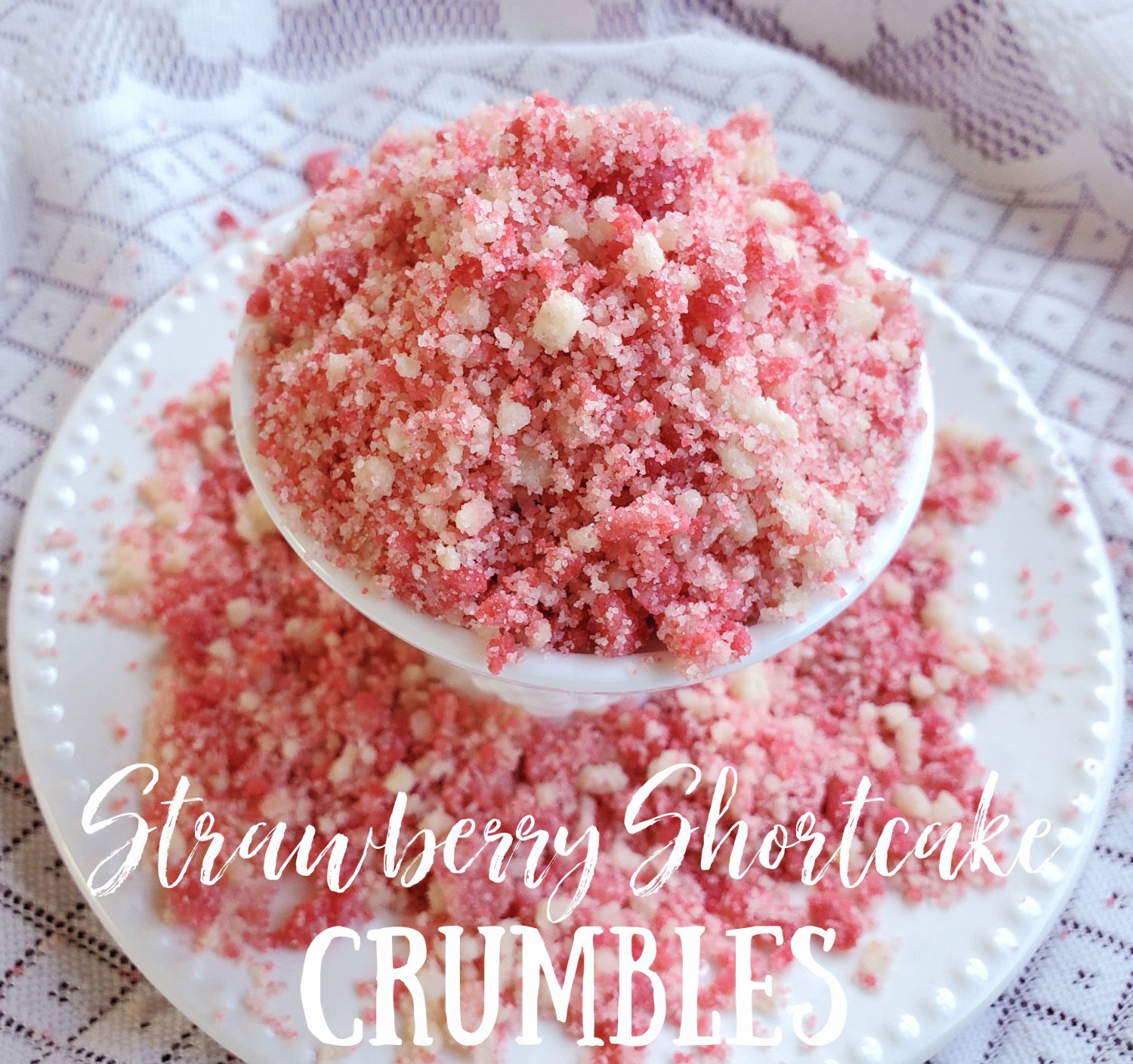 Strawberry Shortcake Freezer Pie: Homemade strawberry ice cream pie without any churning, and a pink punch of strawberry shortcake crumbles. Summer is getting tasty!
