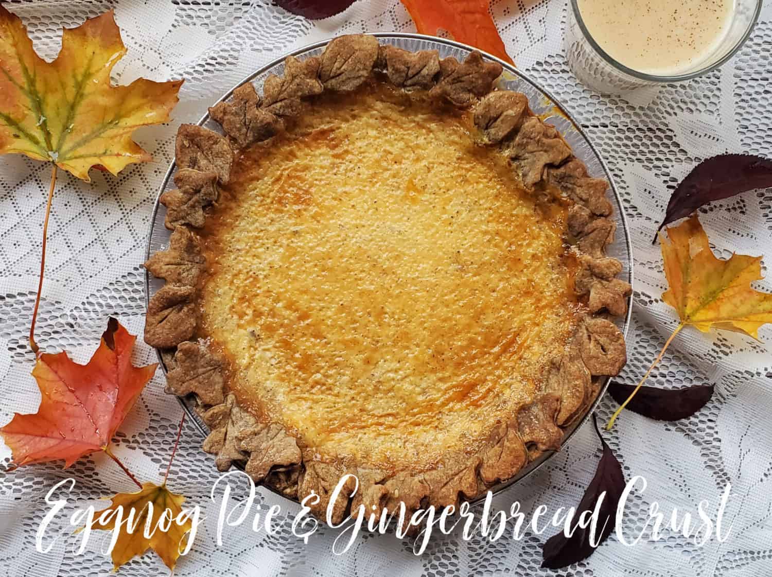 Creamy eggnog, nutmeg and rum, baked in a flakey gingerbread crust adorned with leaf cutouts; holidays rule!