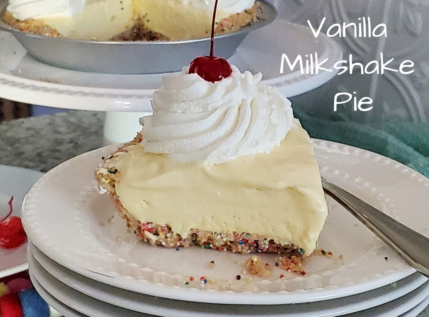 Vanilla Milkshake Pie: Creamy classic frozen vanilla milkshake in a pie in a festive and tasty vanilla wafer crust with crunchy sprinkles!
