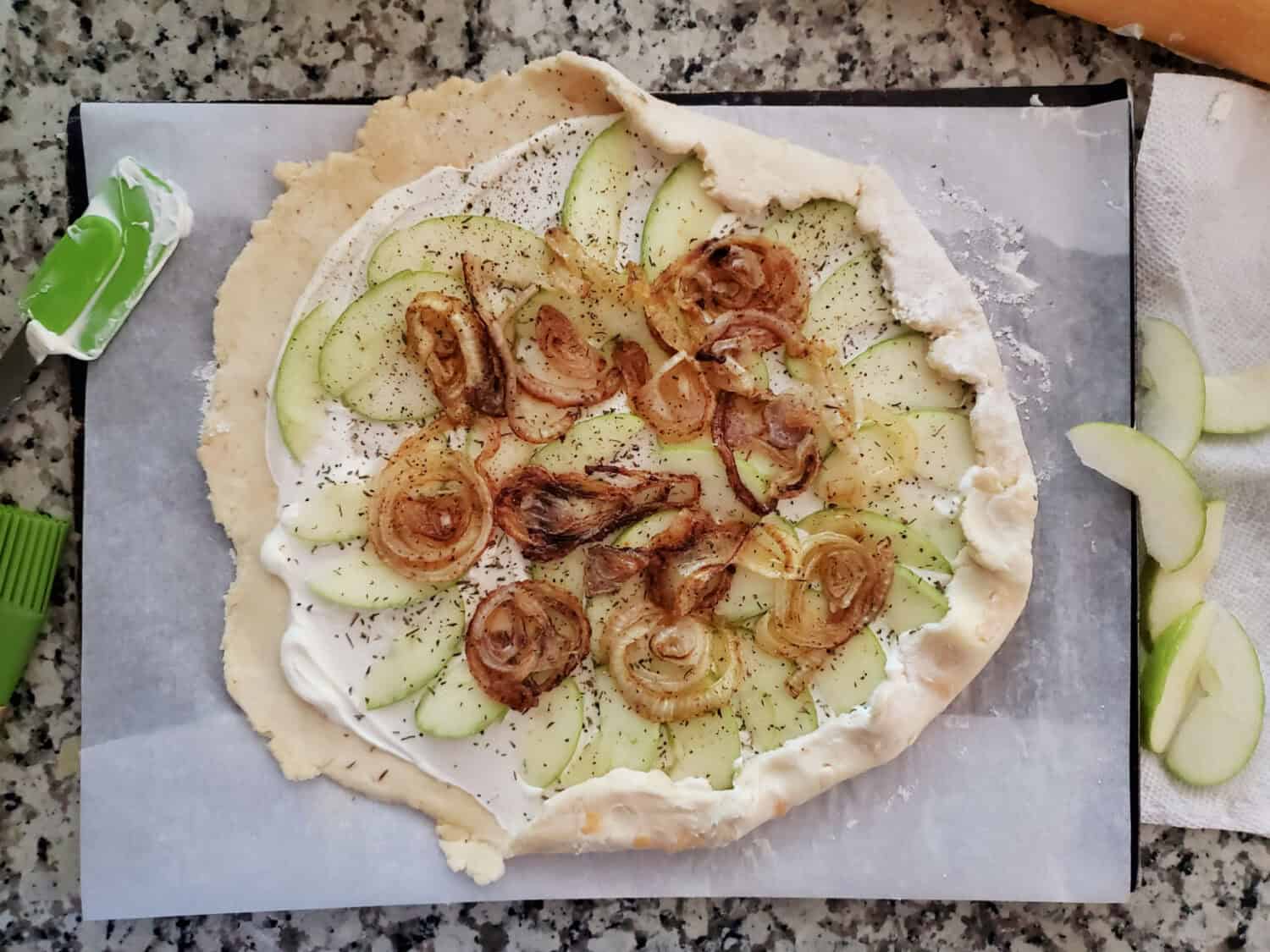 Savory Apple, Caramelized Onions & Sharp White Cheddar Galette: Perfect balance of tartness, natural sweetness, and kick of sharp cheddar. 