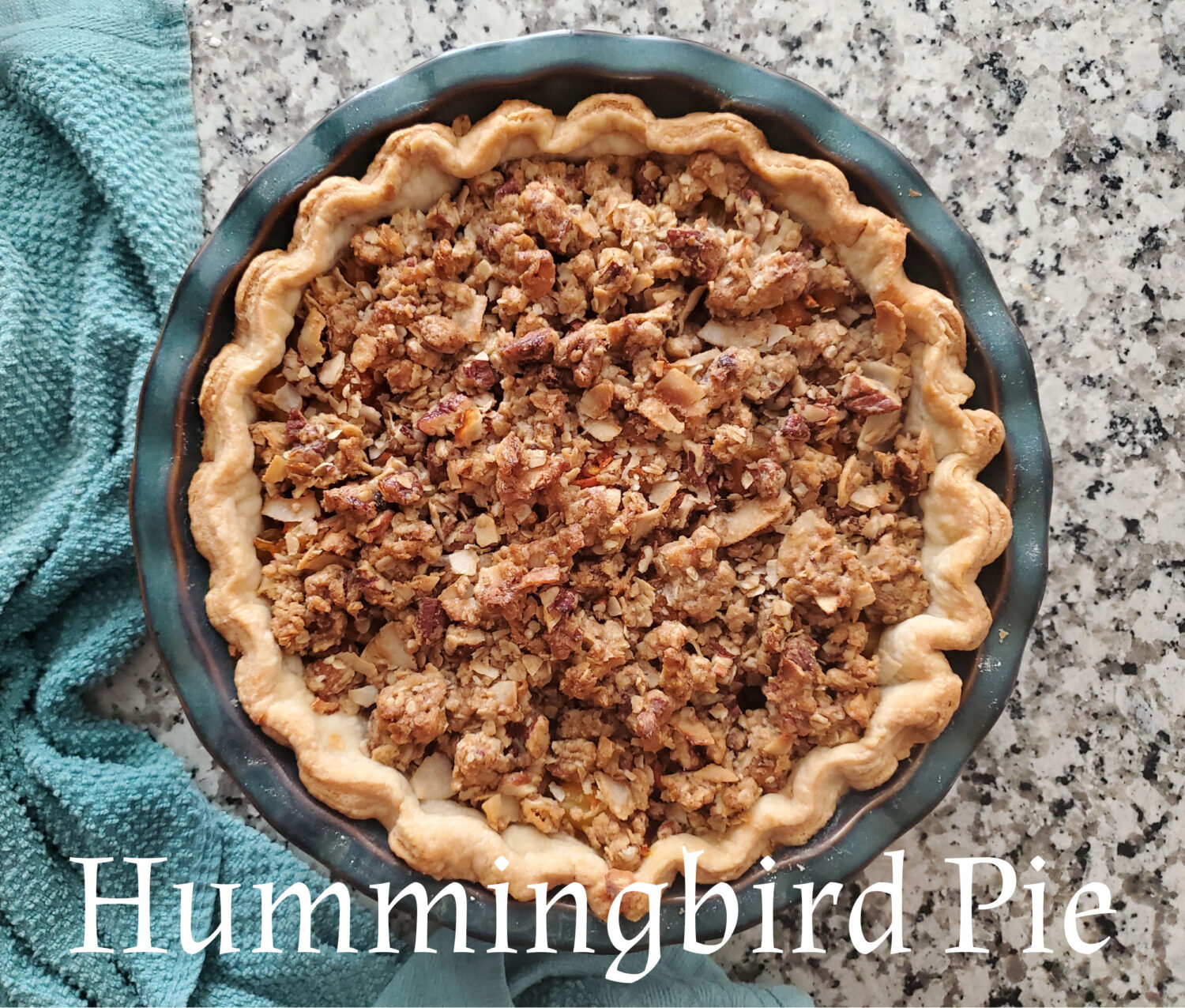 Hummingbird Pie: Tropical fruit, spices, pecans, lightly sweetened with a brown sugar, coconut-pecan crumble, and cream cheese whipped cream.