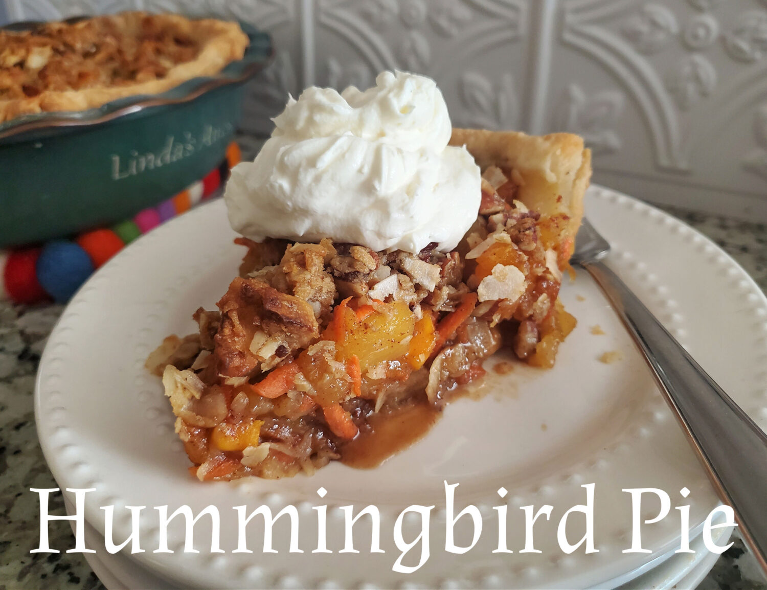 Hummingbird Pie: Tropical fruit, spices, pecans, lightly sweetened with a brown sugar, coconut-pecan crumble, and cream cheese whipped cream.