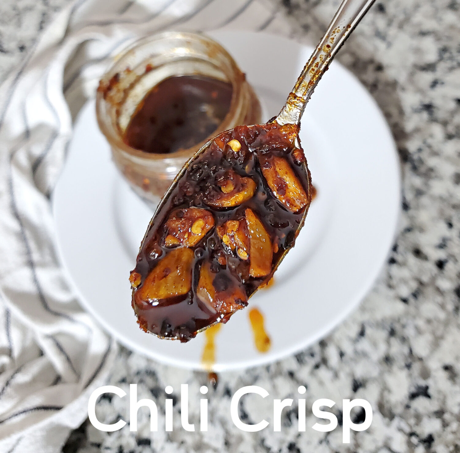 Chili Crisp is an infused chili oil condiment with crunchy bits, with chili peppers, onion, garlic.  Salty, savory and rich umami flavor.
