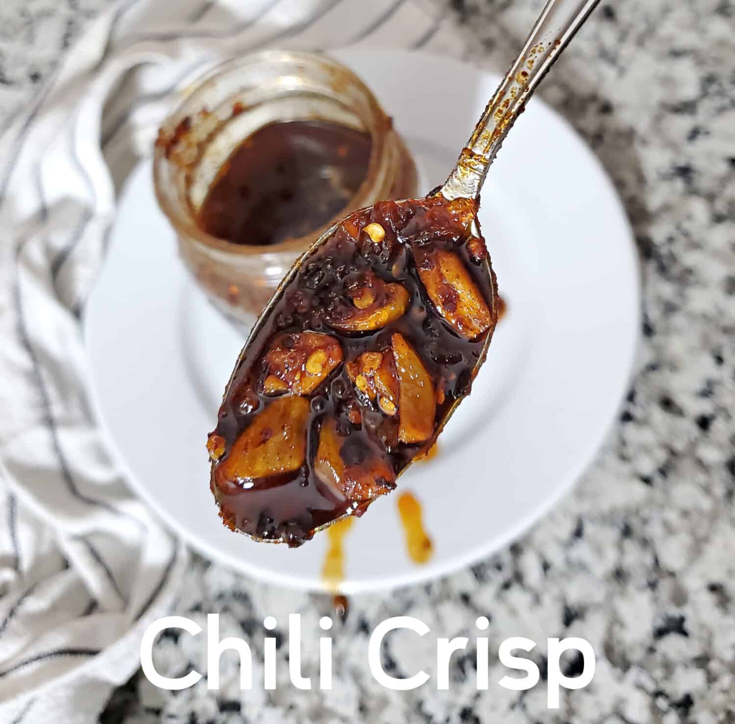 Chili Crisp is an infused chili oil condiment with crunchy bits; chili peppers, onion, garlic, ginger & more. Salty, savory and umami flavor.