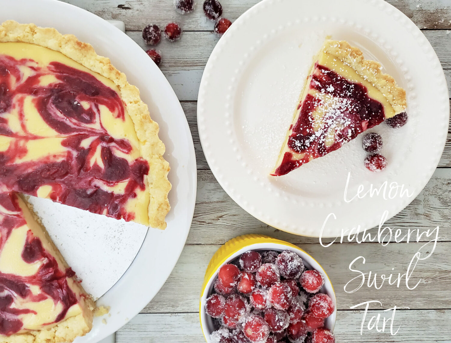 Creamy lemon filling ever with homemade cranberry orange-infused jam in a buttery shortbread crust, topped with luscious sugared cranberries.