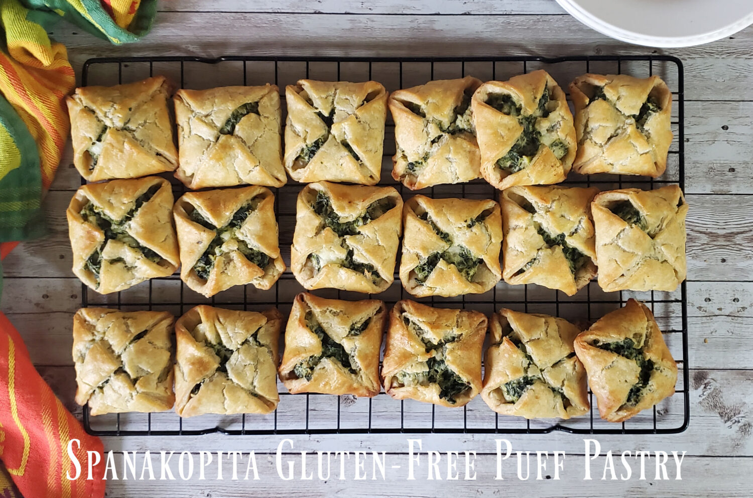 Spanakopita: Creamy ricotta, tangy feta, & garlic together in a tasty spinach filling perfect for your next puff pastry adventure!