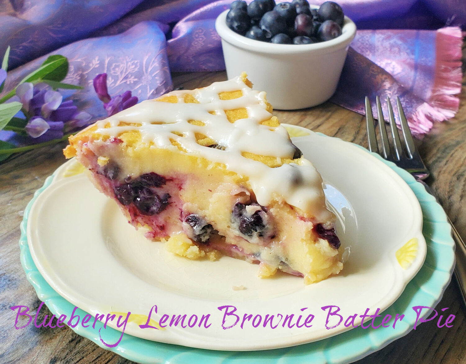 Blueberry Lemon Brownie Batter Pie; the dynamic duo of blueberries & lemon in creamy batter-like pie topped with lemon glaze.