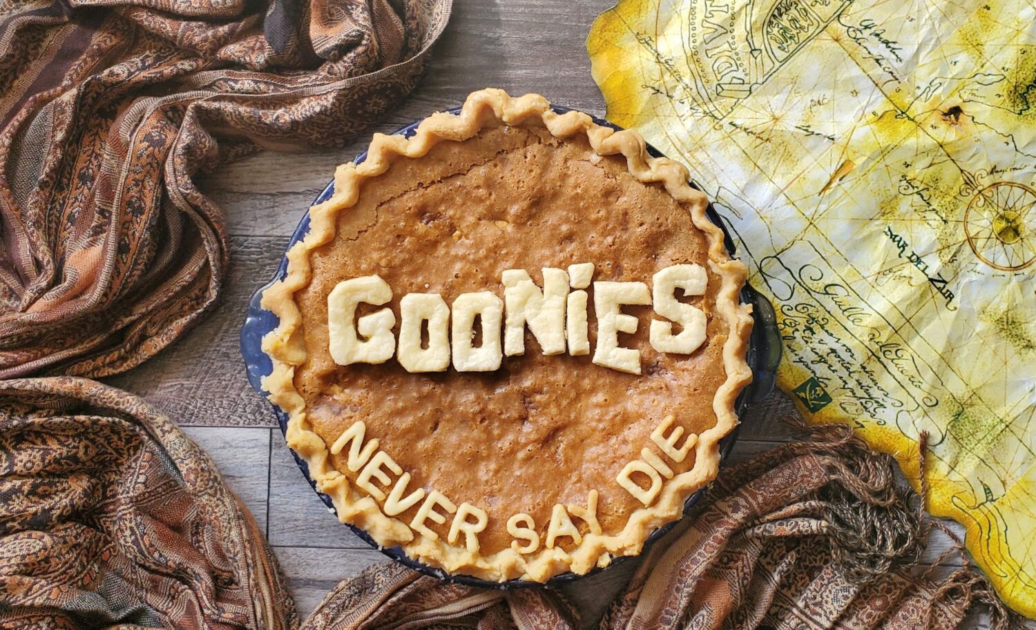 Goonies Baby Ruth Pie-Never Say Die! Gooey cookie batter pie loaded with chopped up Baby Ruth bars. Chunk & Sloth never had it so good.