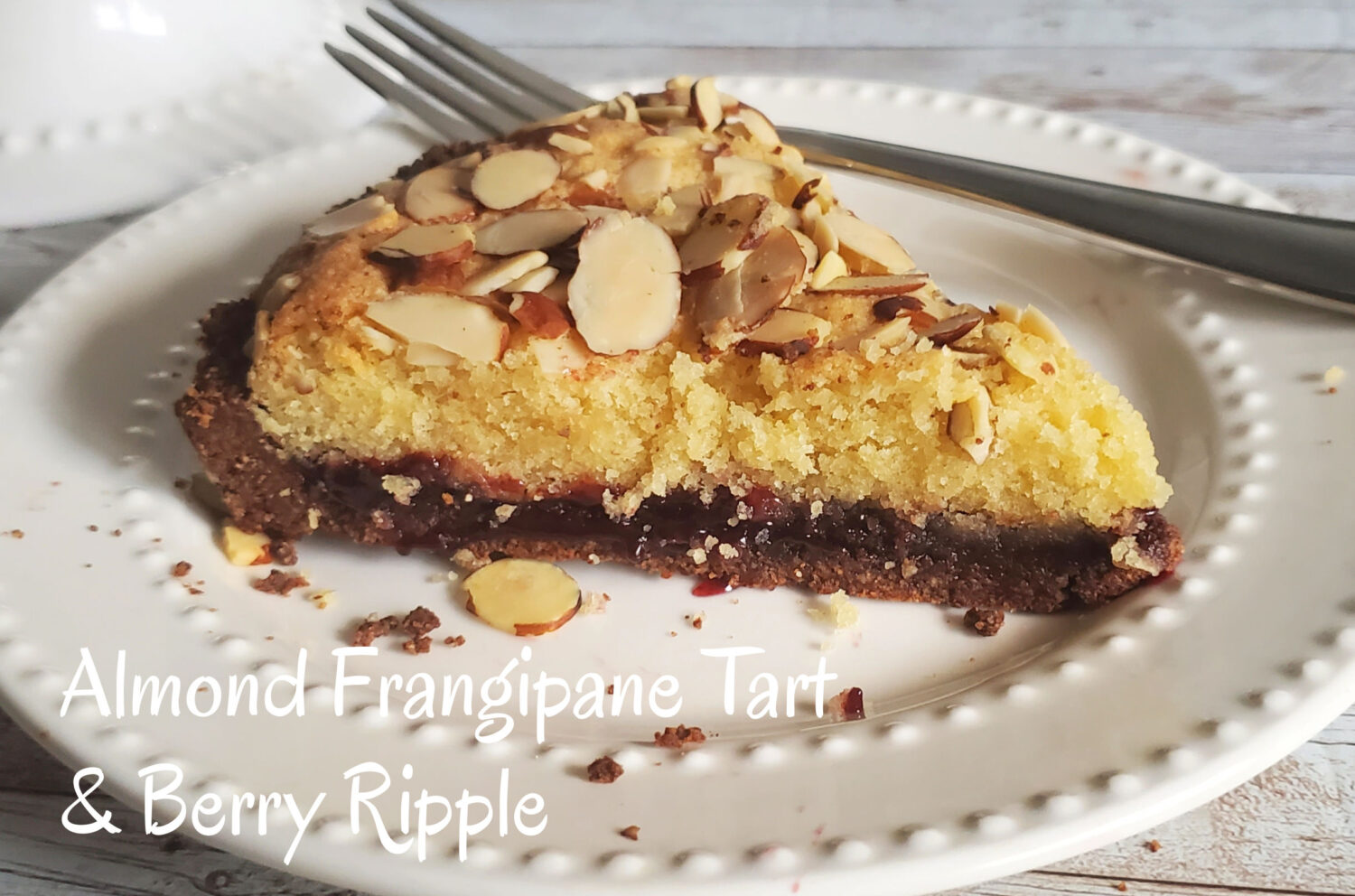 A moist, tender and creamy French almond filling, rippled with a layer of berry jam, topped with sliced almonds and baked in a chocolate almond crust.