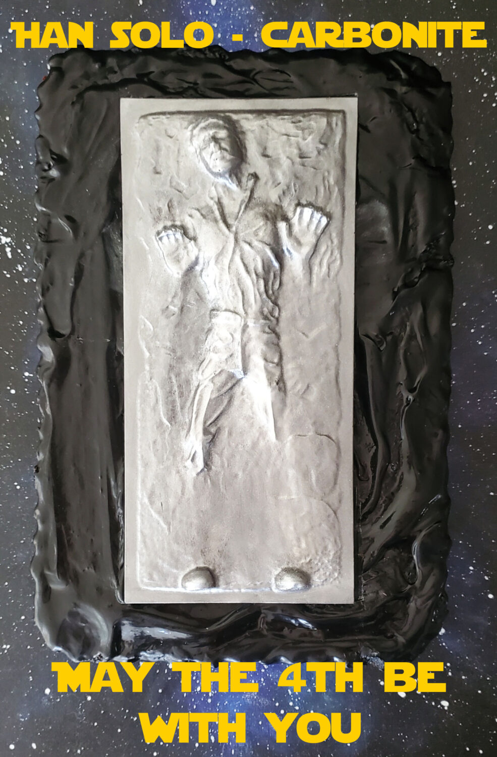 May the 4th Be With You-Han Solo in Carbonite! Han Solo in chocolate served on an almond frangipane tart smothered in dark chocolate ganache.