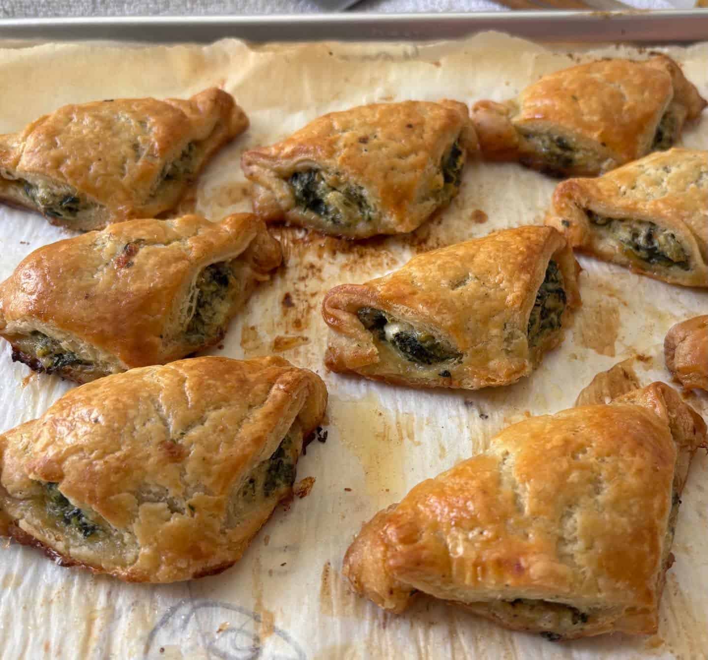 Spanakopita-regular AND gluten-free with all scratch puff pastry for both!  Come to Seaside Farmers Market 8/13, Wednesday #spanakopita #puffpastry #glutenfreepuffpastry
