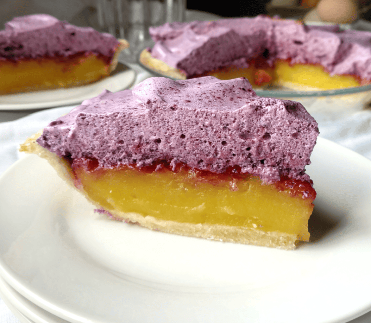 Lemon-zest filling with berry powder flavored fluffy meringue, a beautiful marriage of fruity flavors, all served up in a buttery flaky crust.
