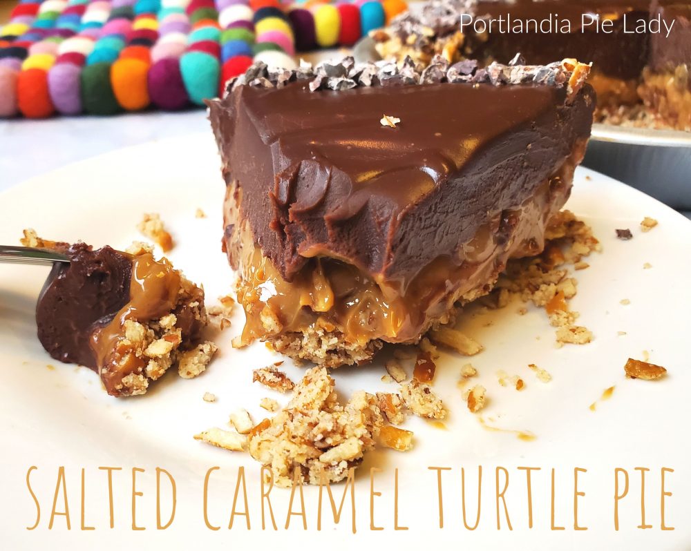 Roasted pecans swirled into decadent creamy salted caramel topped with chocolate ganache in a crispy pretzel crust for a perfect ratio of sweet and salty.