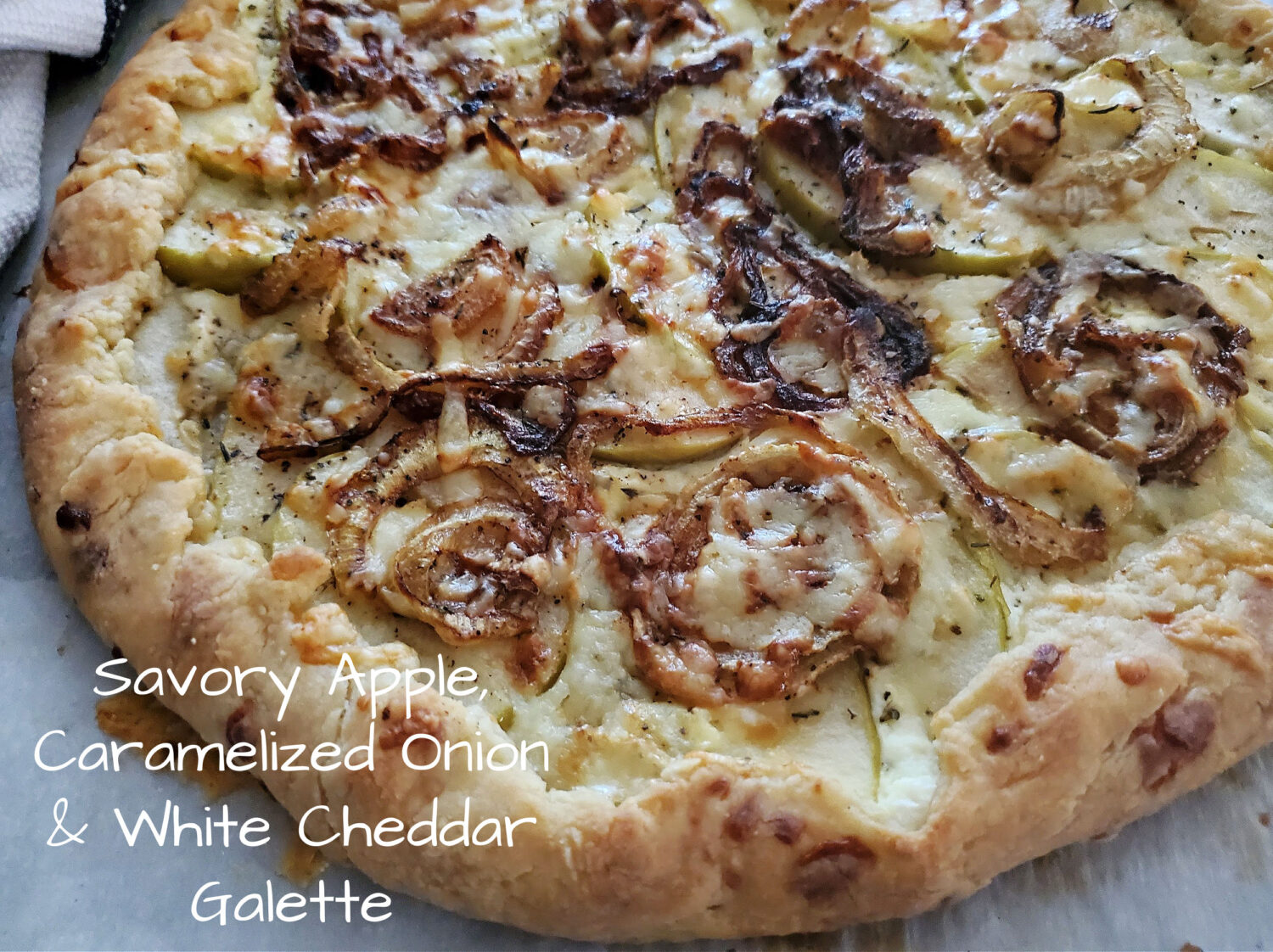 Savory Apple, Caramelized Onions & Sharp White Cheddar Galette: Perfect balance of tartness, natural sweetness, and kick of sharp cheddar. 