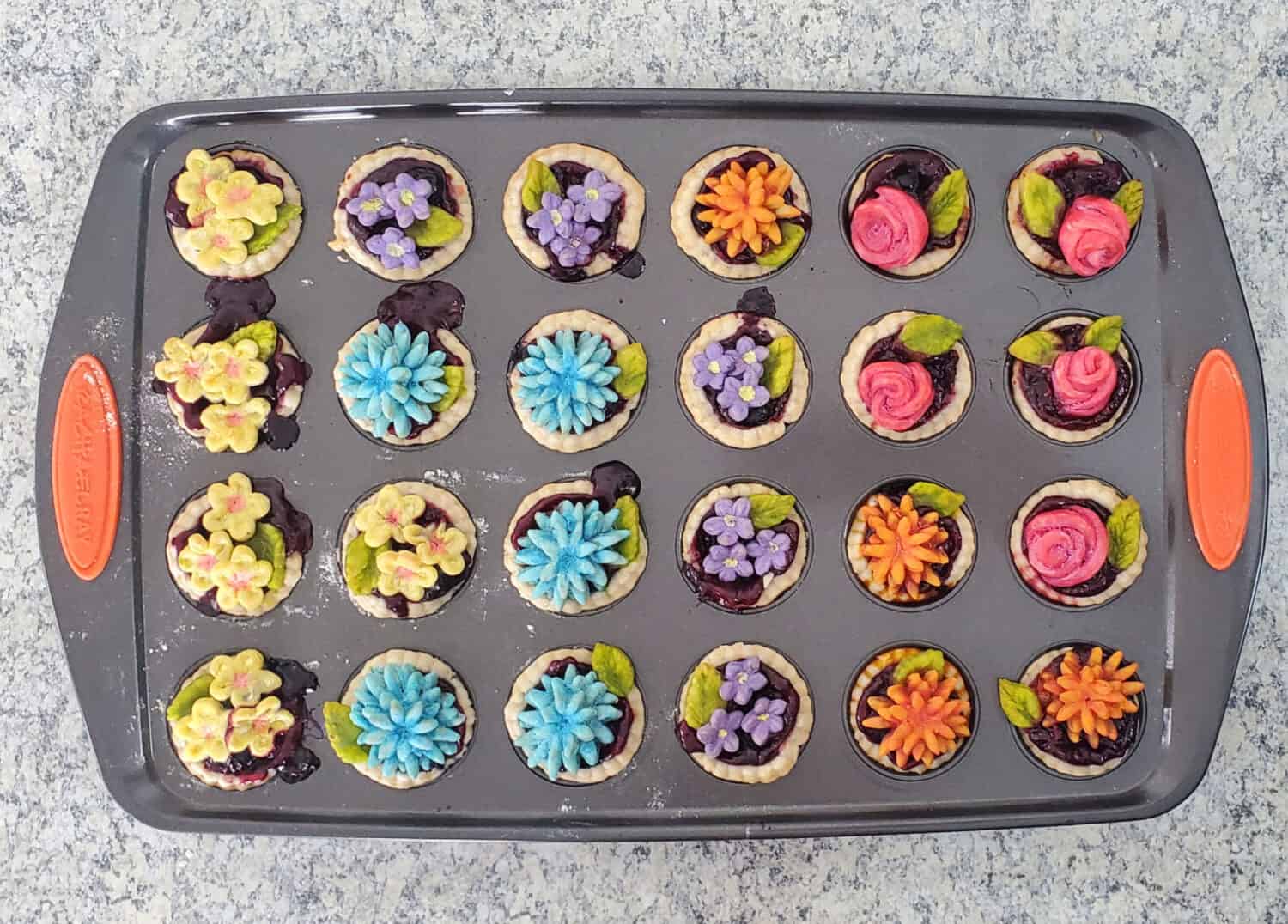 Pie crust flowers for mini pies or a bouquet for a full-size pie. Play with fun colors and make ahead to keep frozen for your next pie!