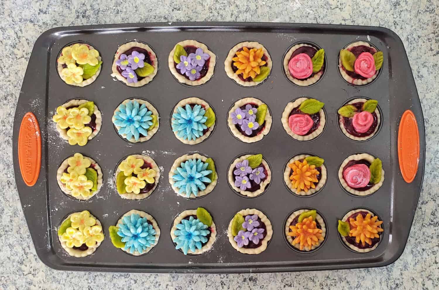 Pie crust flowers for mini pies or a bouquet for a full-size pie. Play with fun colors and make ahead to keep frozen for your next pie!