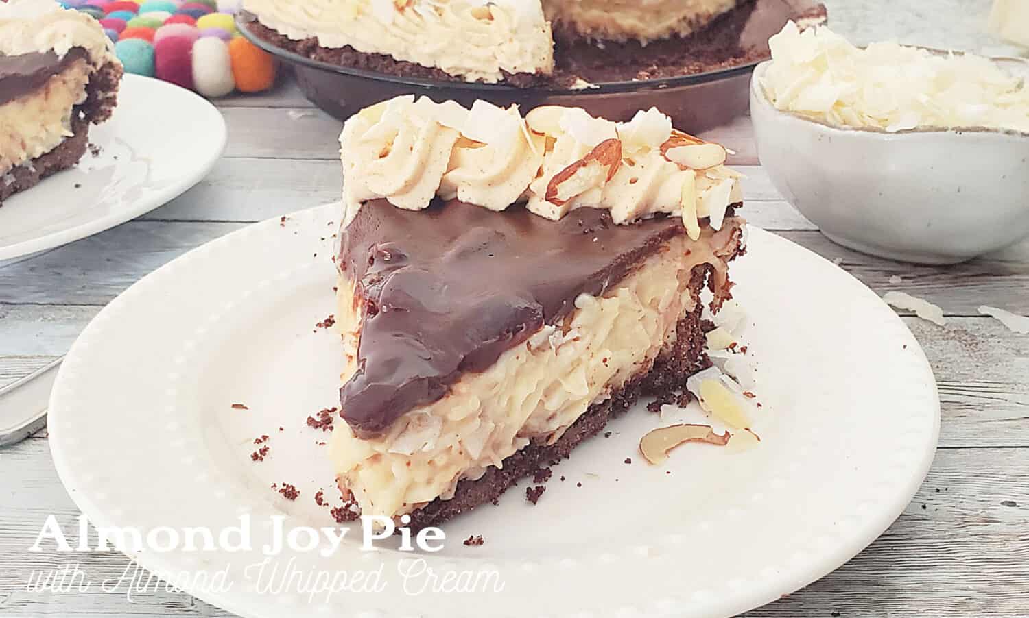 Almond Joy pie, creamy coconut filling, salted almonds, smothered in chocolate ganache & almond whipped cream in a chocolate cookie crust. 