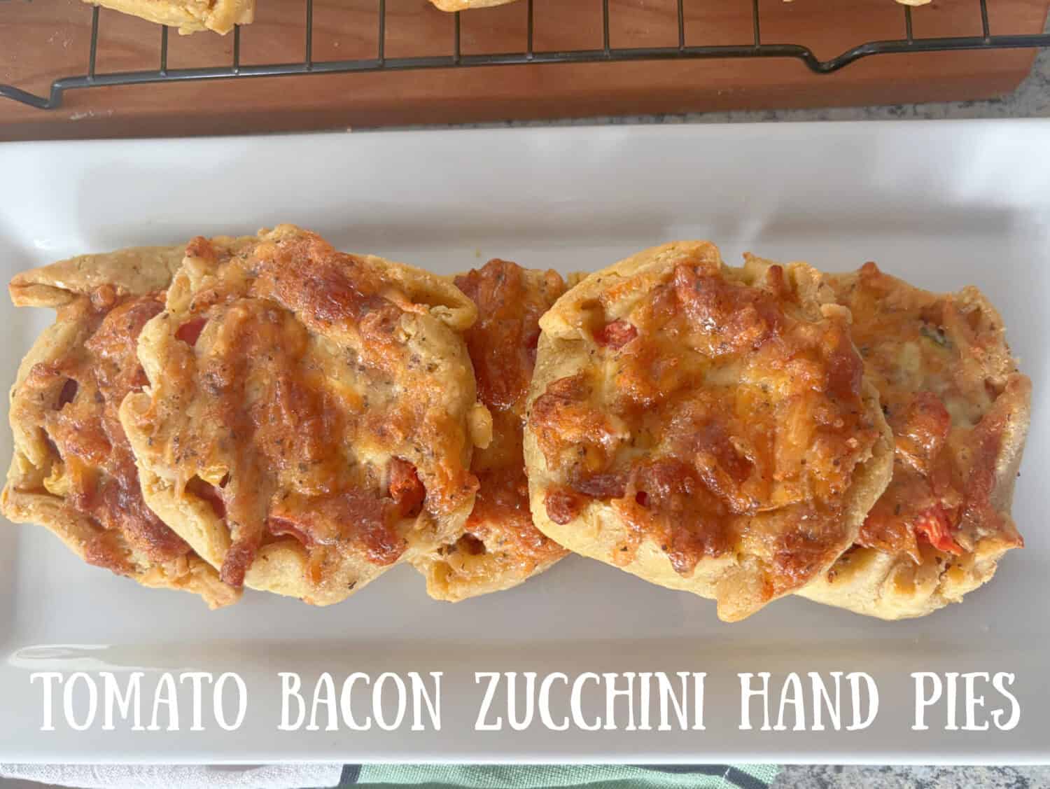 Tomato Bacon Zucchini Hand Pies: A truly divine savory veggie pie, fresh Roma tomatoes, zucchini, basil, garlic & loads of crispy bacon. 