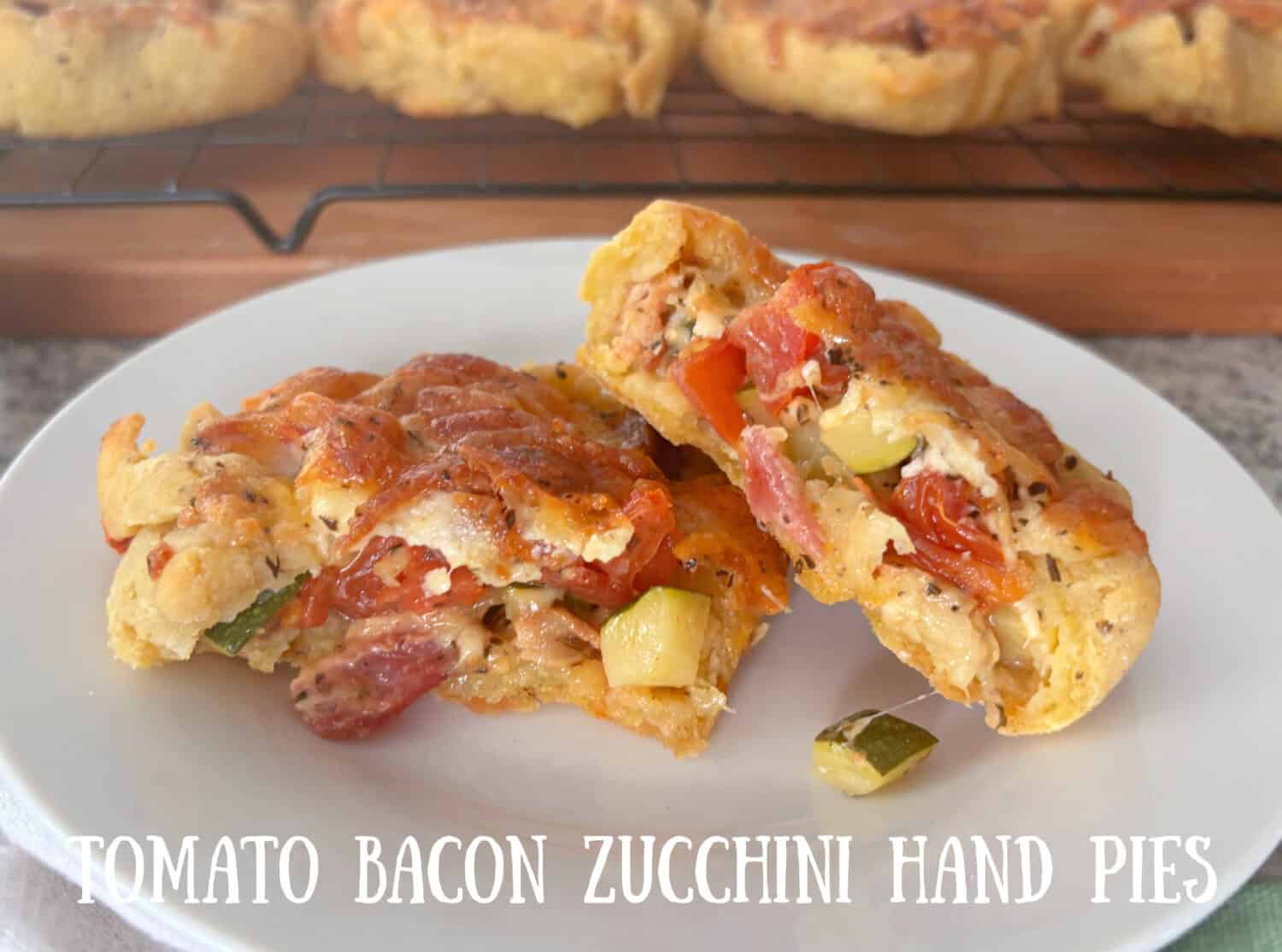 Tomato Bacon Zucchini Hand Pies: A truly divine savory veggie pie, fresh Roma tomatoes, zucchini, basil, garlic & loads of crispy bacon. 