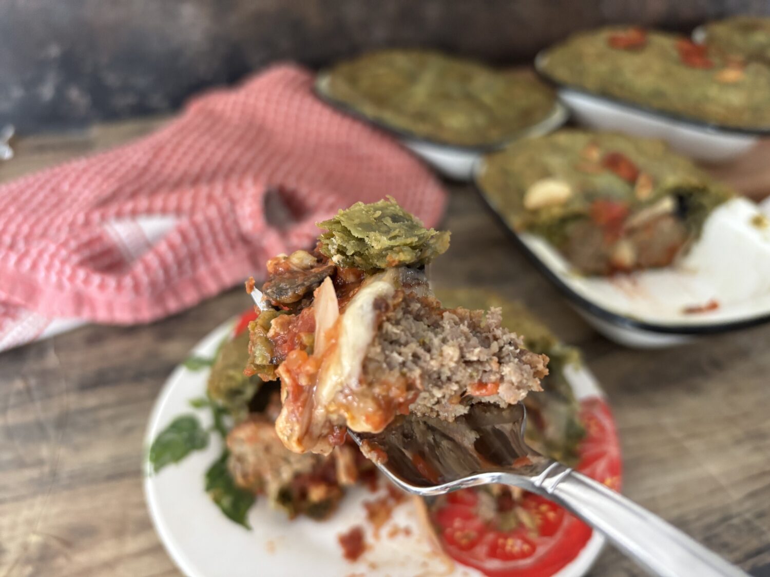 Italian Meatballs paired marinara sauce, Italian cheeses and veggies, all baked in a spinach pastry crust. It's where pizza meets spaghetti and meatballs in an Italian pot pie feast. 