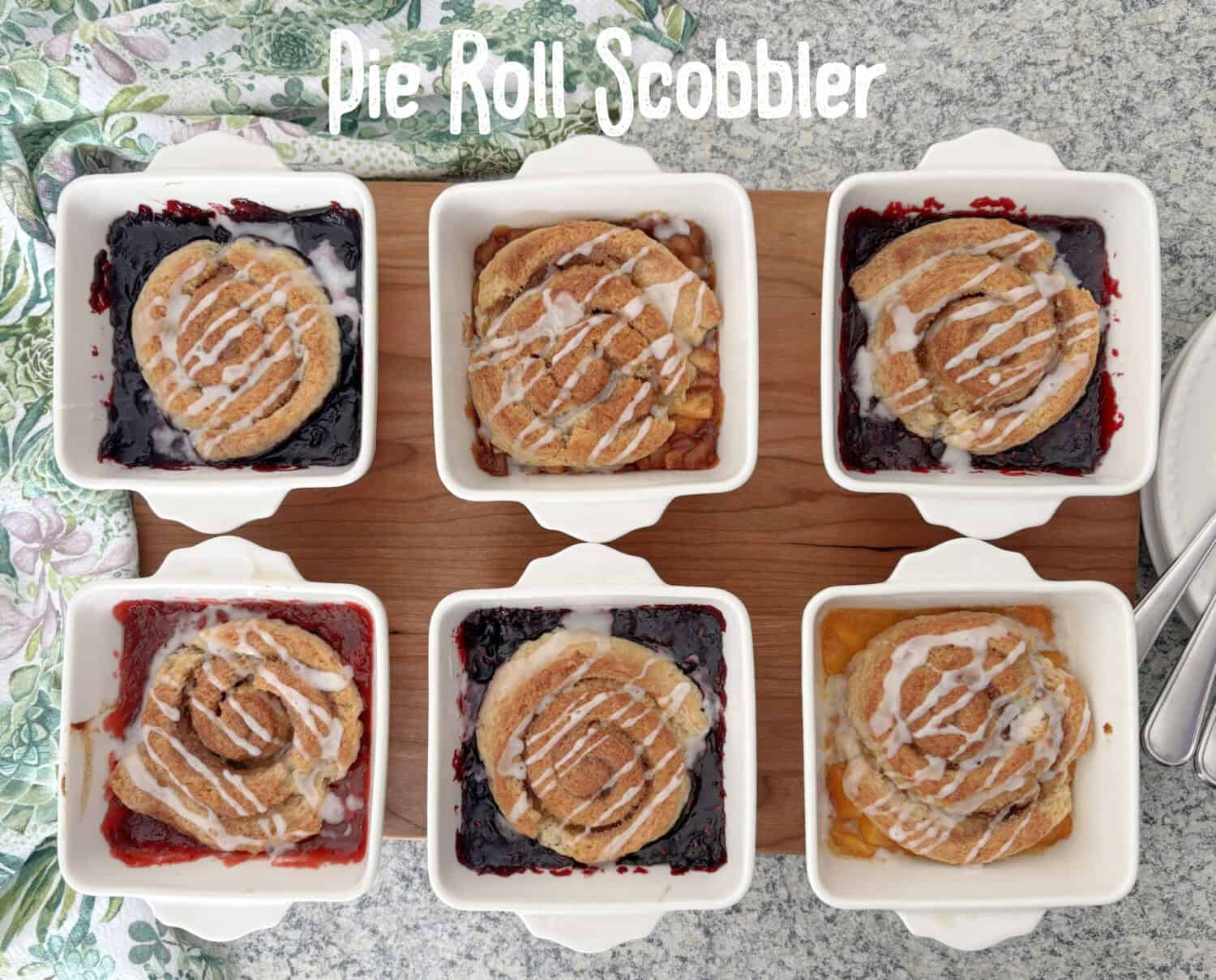 Pie Roll Scobbler is the quintessential culmination of Pie + Cinnamon Roll + Scone + Cobbler, with homemade (or ready made) pie filling.