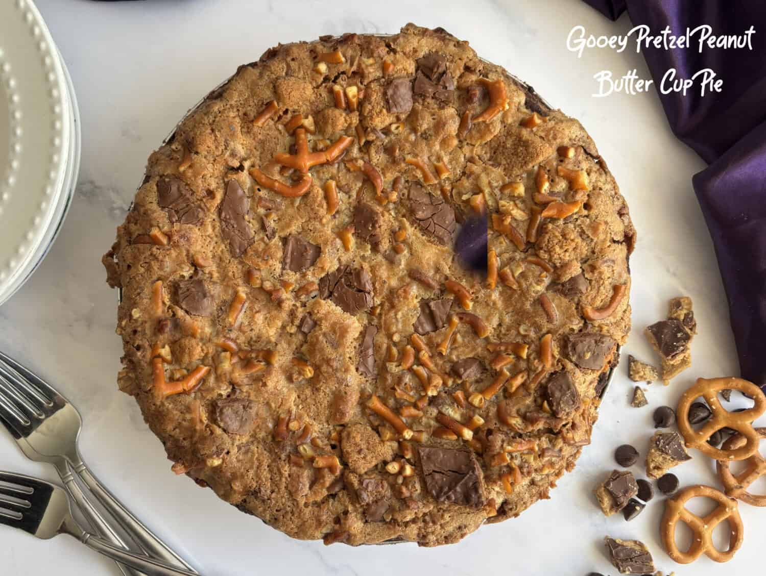 Gooey Pretzel Peanut Butter Cup Pie, inspired by Take-5 Candy bar: Salty pretzels, homemade peanut butter cup filling, and caramel tidbits. 