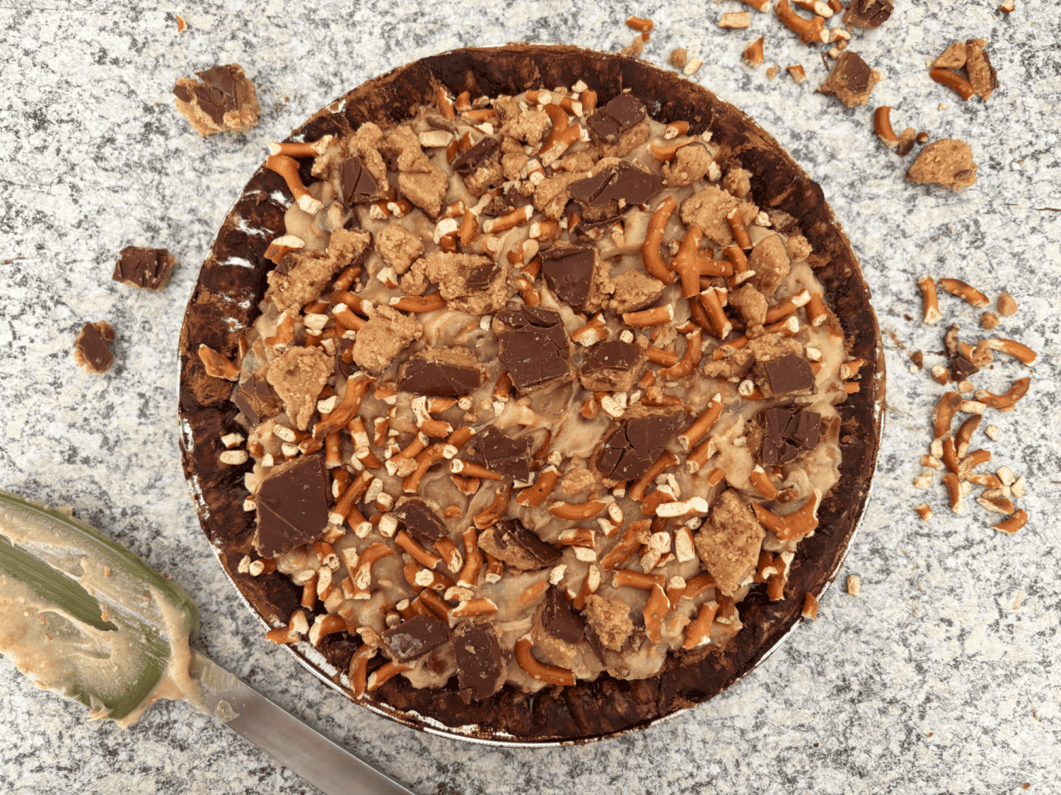 Gooey Pretzel Peanut Butter Cup Pie, inspired by Take-5 Candy bar: Salty pretzels, homemade peanut butter cup filling, and caramel tidbits. 